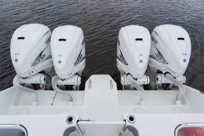 Slide: The Image of Four Yamaha V8 outboard engines on a 2022 SeaHunter 41 CTS boat. - 14