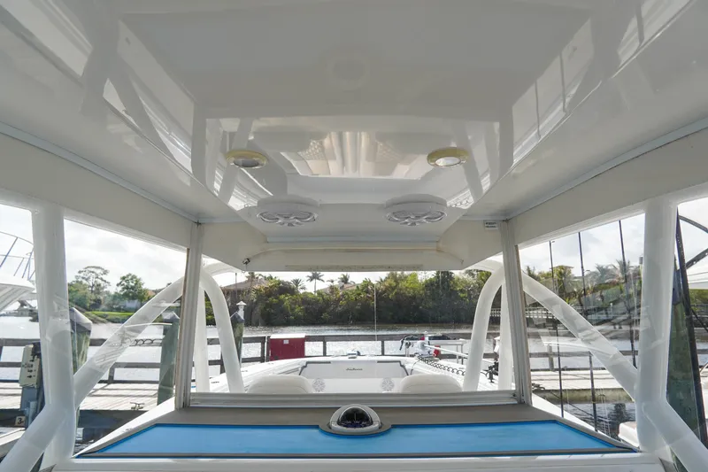 Slide: The Image of Interior view of 2022 SeaHunter 41 CTS boat with sleek design and waterfront backdrop. - 20