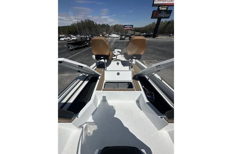 Slide: The Image of 2026 Xpress XR21 Bay boat interior with seating and storage compartments. - 12