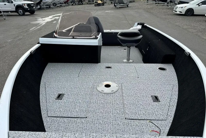 Slide: The Image of 2026 Smoker Craft Lazer 161 boat interior with seating and storage compartments. - 4