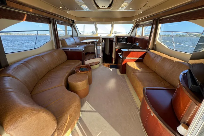 Slide: The Image of Luxurious interior of a 2005 Sea Ray 500 Sedan Bridge yacht with leather seating. - 23