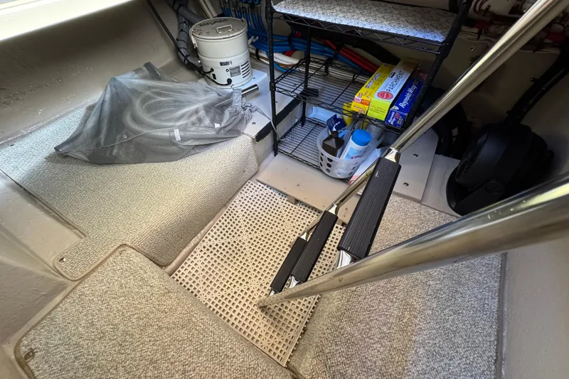 Slide: The Image of Interior storage area of a 2005 Sea Ray 500 Sedan Bridge yacht. - 34