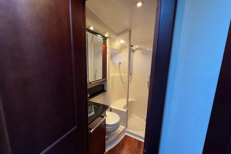 Slide: The Image of Luxurious bathroom in 2005 Sea Ray 500 Sedan Bridge yacht with shower and vanity. - 42