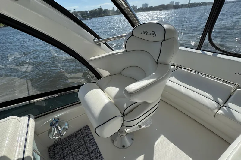 Slide: The Image of Luxurious interior of 2005 Sea Ray 500 Sedan Bridge yacht with plush seating. - 58