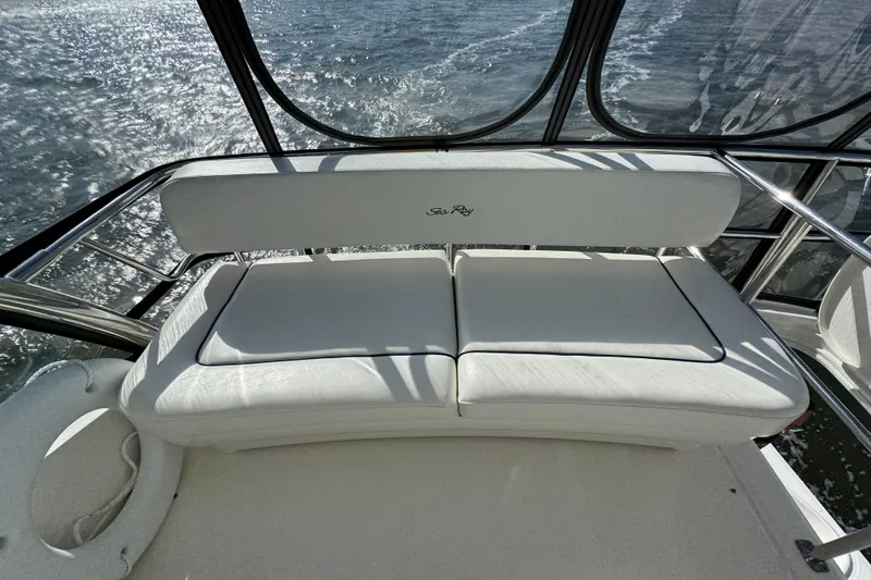 Slide: The Image of White seating area on 2005 Sea Ray 500 Sedan Bridge yacht. - 60