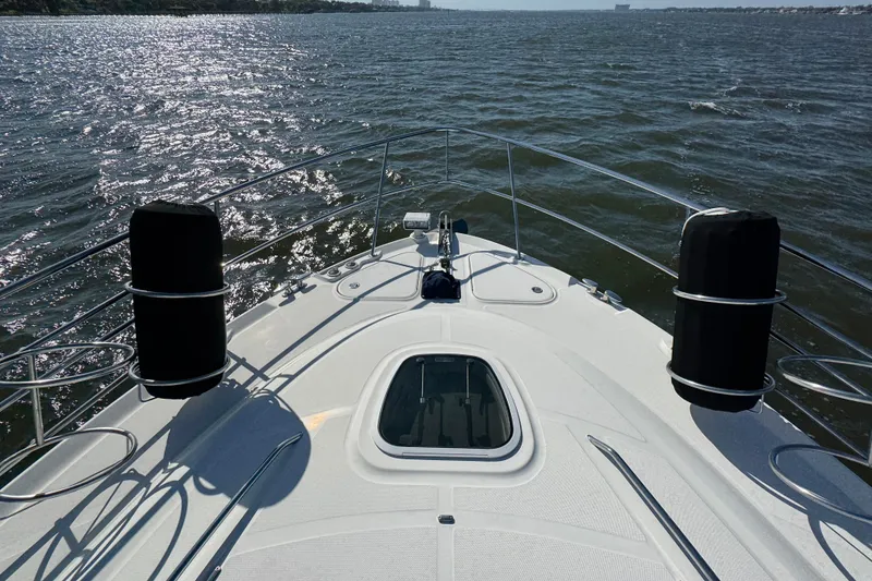 Slide: The Image of Bow view of 2005 Sea Ray 500 Sedan Bridge on open water. - 66