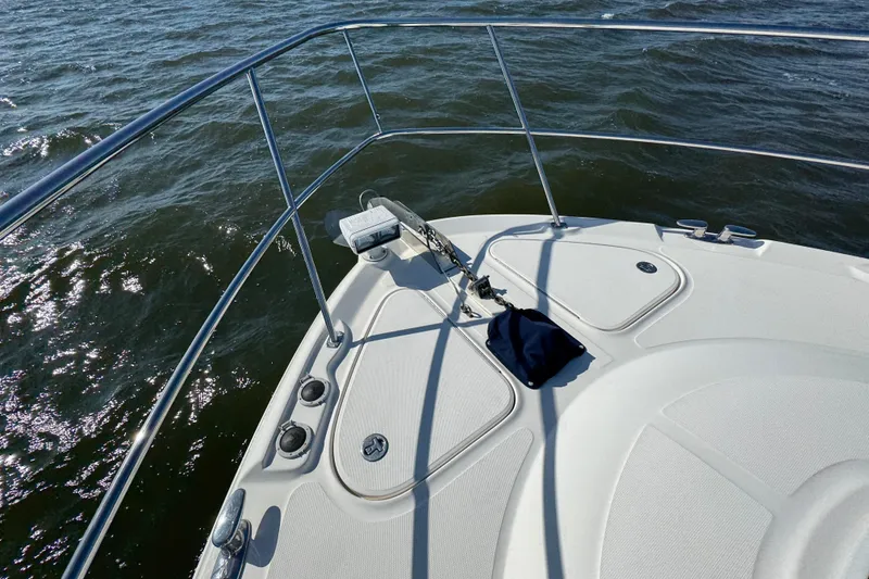 Slide: The Image of Bow of 2005 Sea Ray 500 Sedan Bridge yacht on open water. - 67