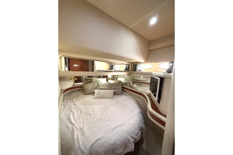Slide: The Image of Luxurious interior cabin of 1999 Sea Ray 480 Sedan Bridge yacht. - 53