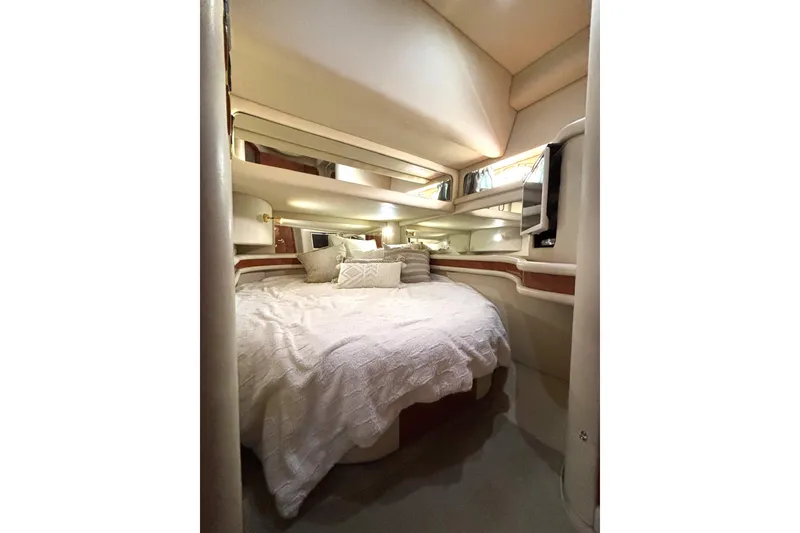 Slide: The Image of Luxurious cabin interior of 1999 Sea Ray 480 Sedan Bridge yacht. - 54