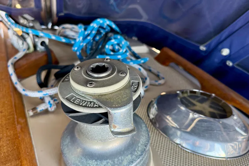 Slide: The Image of Winch and ropes on a 1988 Catalina 34 sailboat deck. - 10