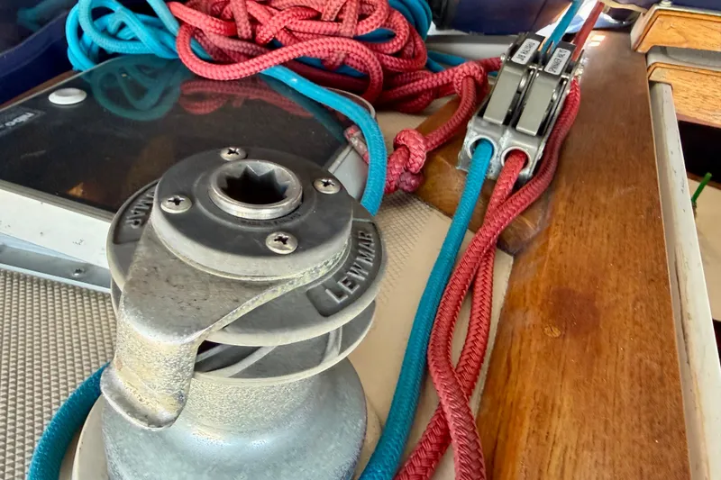 Slide: The Image of Winch and ropes on a 1988 Catalina 34 sailboat deck. - 9