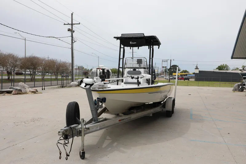 Slide: The Image of 2002 Ranger 2300 Bay Ranger boat on trailer in parking lot. - 8