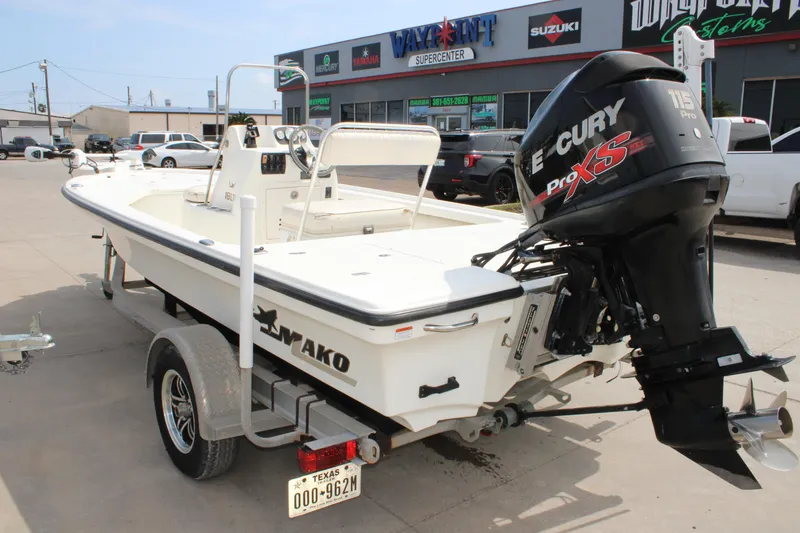 Slide: The Image of 2014 Mako 18 LTS boat with Mercury Pro XS engine on trailer. - 8