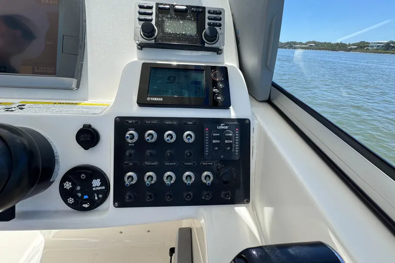 Slide: The Image of Control panel of a 2012 Edgewater 245CX Crossover boat with Yamaha display. - 20