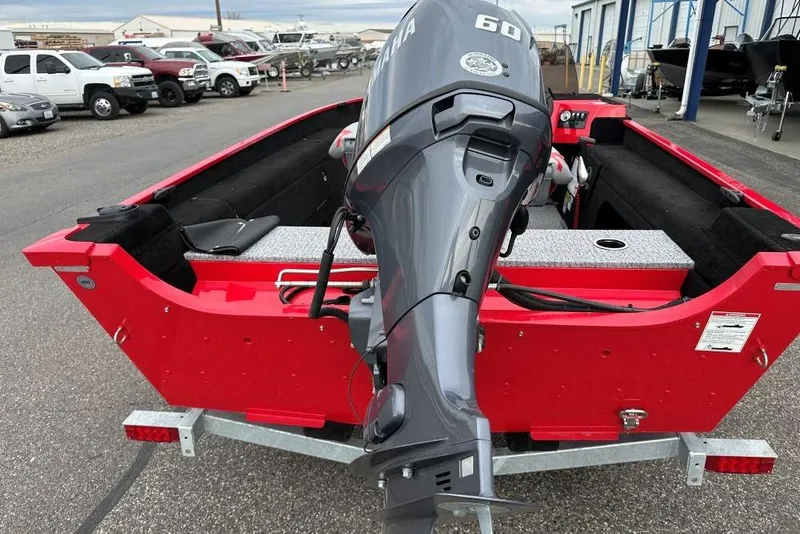 Slide: The Image of Red 2026 Smoker Craft Lazer 161 boat with Yamaha 60 outboard motor on trailer. - 4