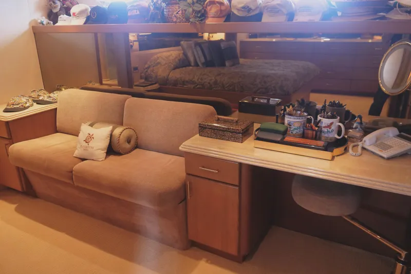 Slide: The Image of Luxurious Westport 112 yacht interior with cozy seating, desk, and decor, year 2000. - 18