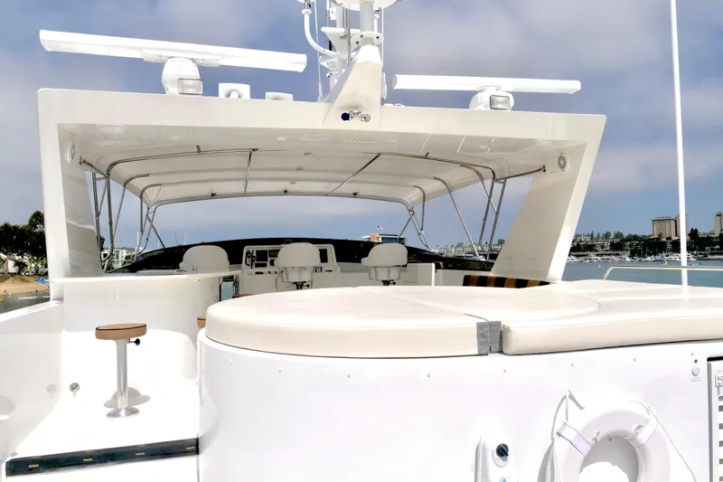 Slide: The Image of Luxurious 2000 Westport 112 yacht deck with seating and ocean view. - 33