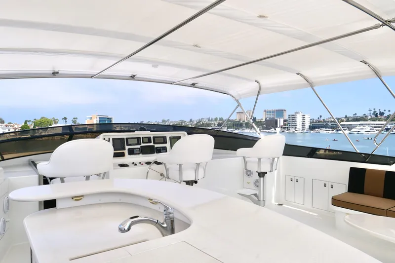Slide: The Image of Luxurious 2000 Westport 112 yacht deck with modern seating and ocean view. - 34