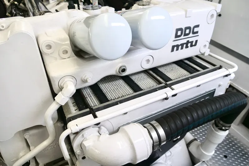 Slide: The Image of Engine compartment of a 2000 Westport 112 yacht, featuring DDC MTU components. - 44