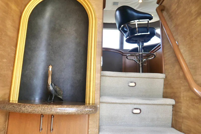Slide: The Image of Staircase with decorative niche and bar stool on Westport 112 yacht, 2000 model. - 51