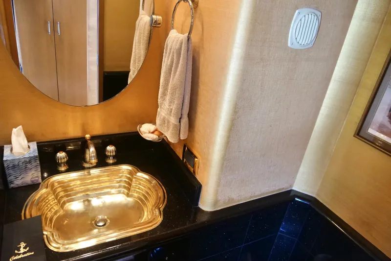Slide: The Image of Luxurious bathroom with gold sink on Westport 112 yacht, 2000 model. - 52