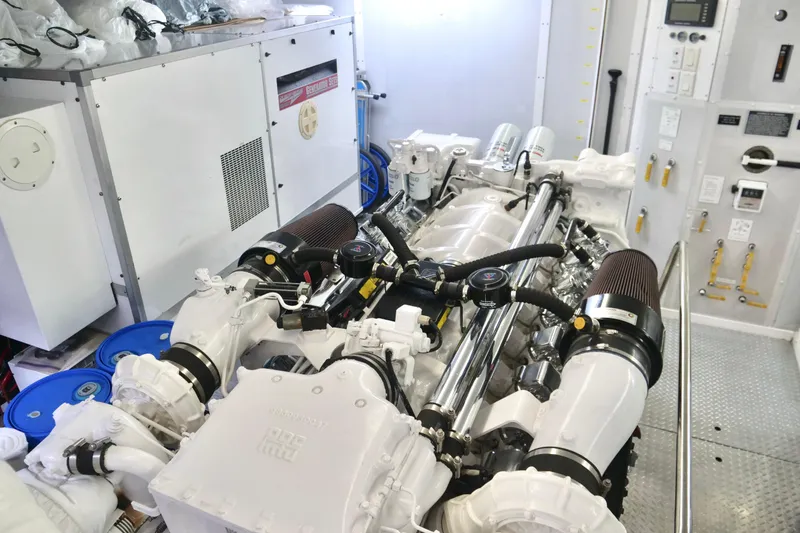 Slide: The Image of Engine room of a 2000 Westport 112 yacht, showcasing a powerful marine engine. - 55