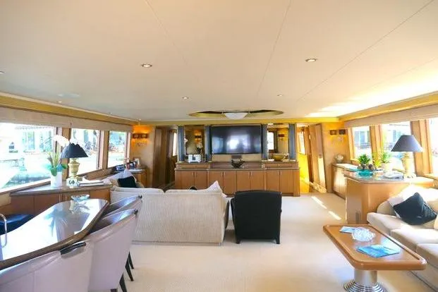 Slide: The Image of Luxurious interior of 2000 Westport 112 yacht with elegant furnishings and large windows. - 57