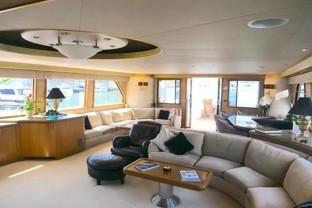 Slide: The Image of Luxurious interior of 2000 Westport 112 yacht with elegant seating and decor. - 58