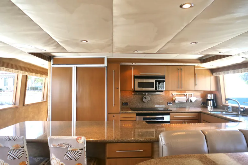 Slide: The Image of Luxurious kitchen interior on 2000 Westport 112 yacht with modern appliances and elegant design. - 66