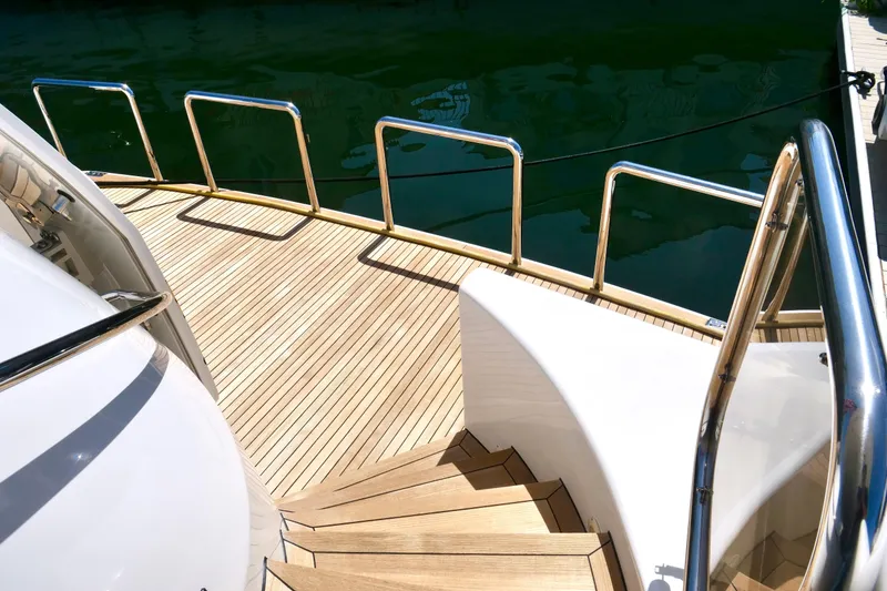 Slide: The Image of Luxury yacht deck with wooden flooring and stainless steel railings, Westport 112, year 2000. - 68