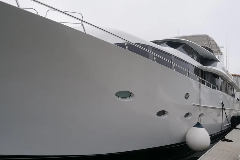 Slide: The Image of Luxurious 2000 Westport 112 yacht docked, showcasing sleek design and modern elegance. - 72