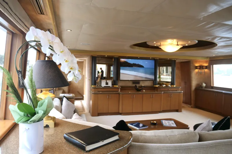 Slide: The Image of Luxurious interior of 2000 Westport 112 yacht with elegant decor and large screen TV. - 74