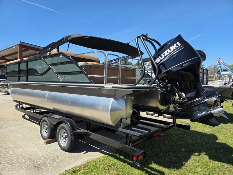 Slide: The Image of 2026 Bentley Pontoons Legacy 223 with Suzuki engine on trailer. - 2