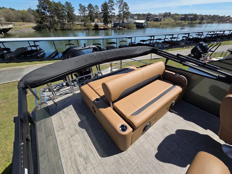 Slide: The Image of 2026 Bentley Pontoons Legacy 223 Swingback on a serene lake. - 4