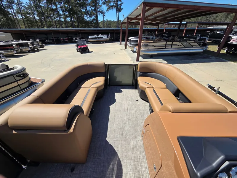 Slide: The Image of Interior of 2026 Bentley Pontoons Legacy 223 Swingback with beige seating. - 7