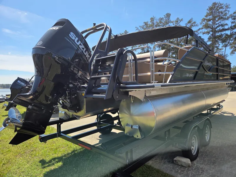 Slide: The Image of 2026 Bentley Pontoons Legacy 223 on trailer with Suzuki engine. - 8