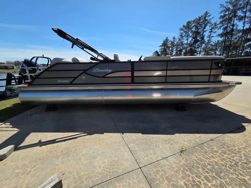 The Image of 2026 Bentley Pontoons Legacy Quad 243 on a sunny dock. - 0