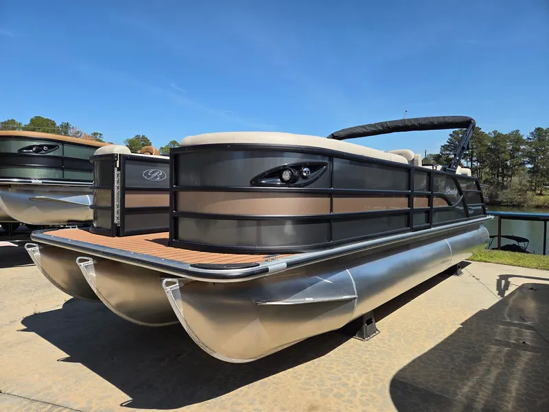 Slide: The Image of 2026 Bentley Pontoons Legacy Quad 243 on a sunny dock. - 4
