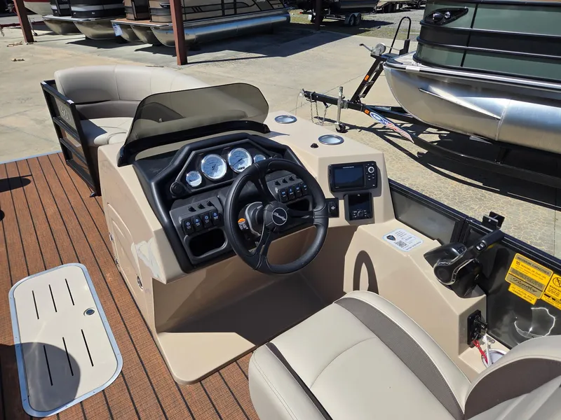 Slide: The Image of Interior view of Bentley Pontoons Legacy Quad 243, model year 2026. - 8