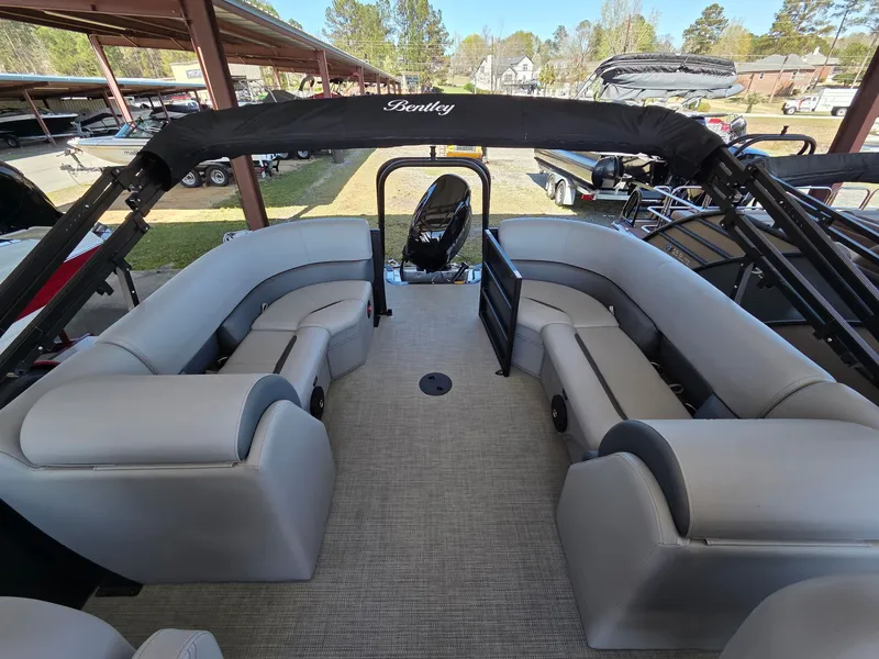 Slide: The Image of Interior view of the 2026 Bentley Pontoons Legacy 220 Navigator. - 2
