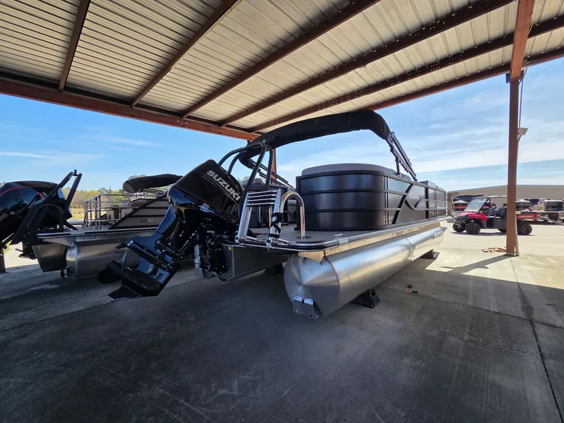 Slide: The Image of 2026 Bentley Pontoons Legacy 220 Navigator under a carport. - 5