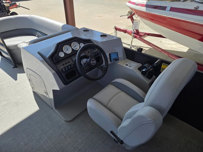 Slide: The Image of Interior view of Bentley Pontoons Legacy 220 Navigator 2026 helm. - 6