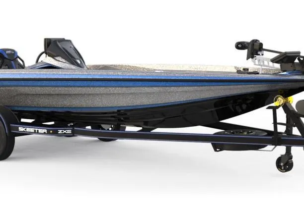 The Image of 2026 Skeeter ZXE20 fishing boat with sleek design and blue accents on trailer. - 1
