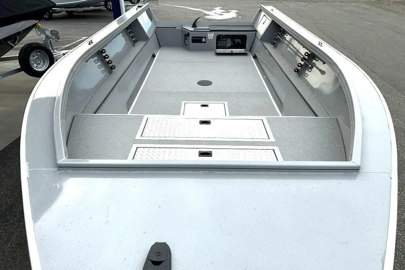 Slide: The Image of 2026 Smoker Craft Pro V Sportsman 1872 CC boat interior, featuring spacious deck and storage compartments. - 3