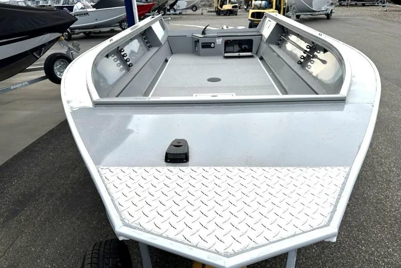 Slide: The Image of 2026 Smoker Craft Pro V Sportsman 1872 CC boat, aluminum deck, parked outdoors. - 4