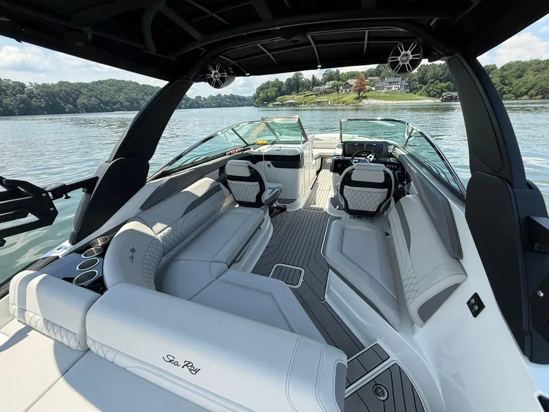 Slide: The Image of 2023 Sea Ray SLX 260 Surf boat interior with luxurious seating and modern design. - 17