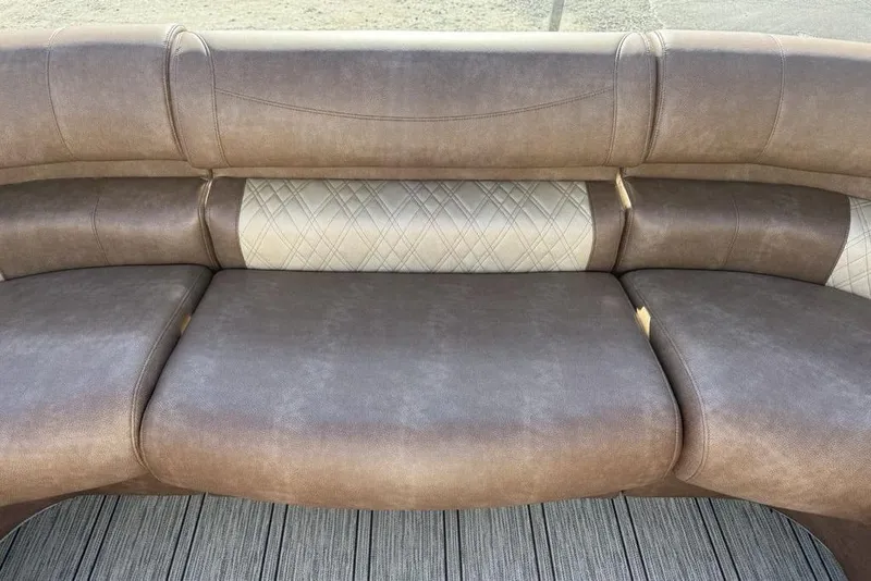 Slide: The Image of Luxurious seating in 2026 Premier 330 Escalante, featuring elegant brown upholstery. - 15