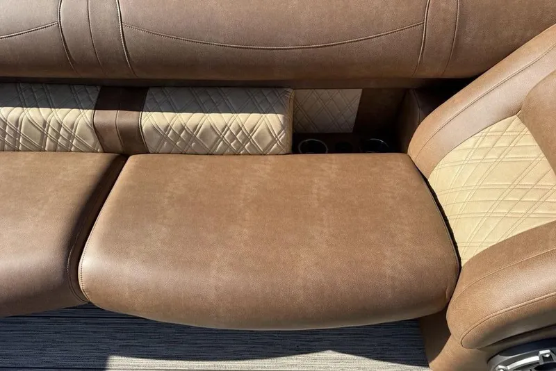 Slide: The Image of Luxurious brown leather seating in 2026 Premier 330 Escalante with quilted accents. - 19