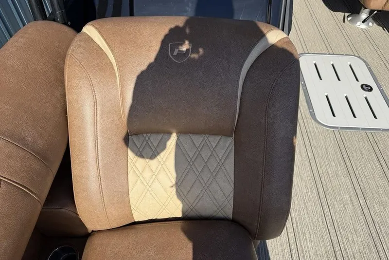 Slide: The Image of Brown leather seat of 2026 Premier 330 Escalante boat with quilted design. - 22
