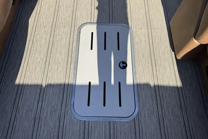 Slide: The Image of Floor hatch on 2026 Premier 330 Escalante boat, featuring sleek design and durable materials. - 27